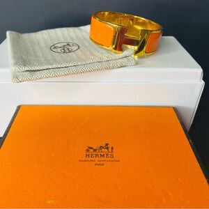 HERMES Signature Orange Enamel and Gold Plated Clic-Clac H GM Wide Bracelet